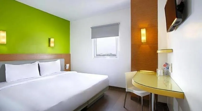Bed in Amaris Hotel La Codefin Kemang