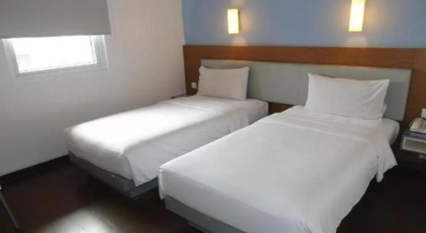 Bed in Amaris Hotel La Codefin Kemang