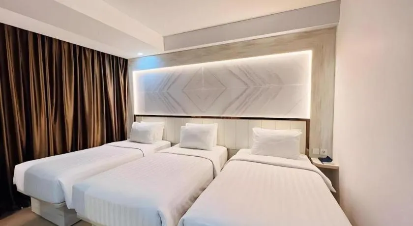 Bed in The Belagri Hotel and Convention