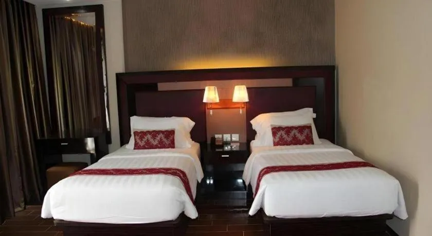 Bed in The Belagri Hotel and Convention