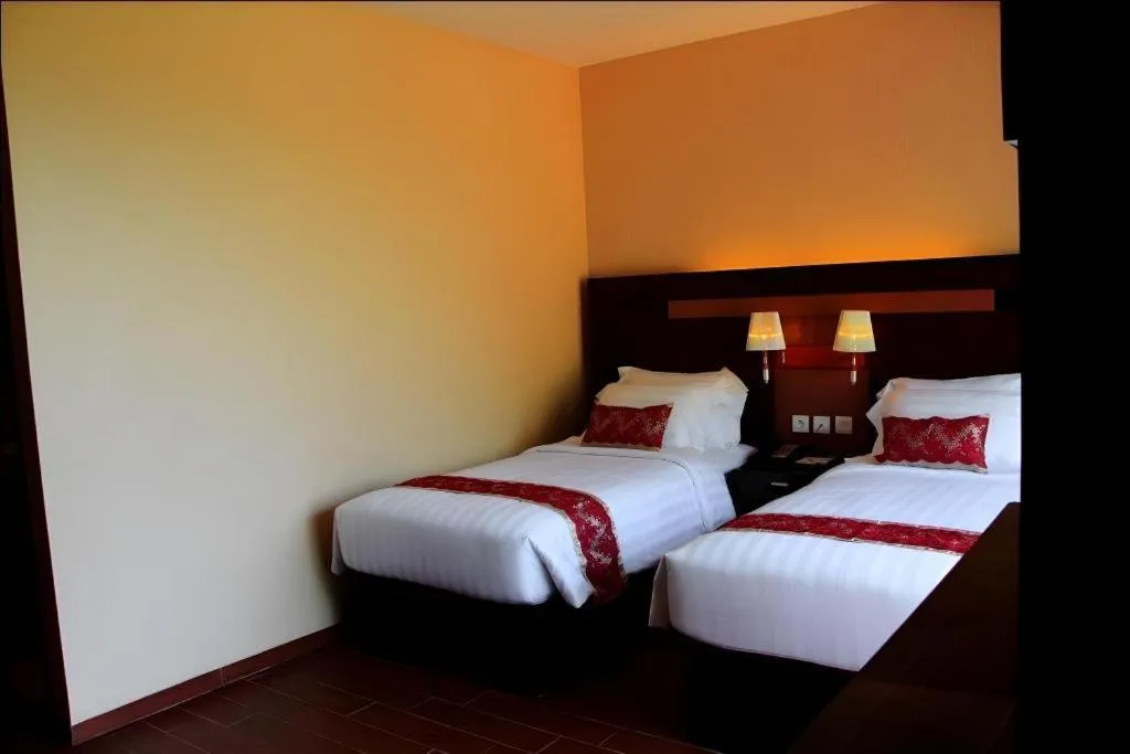 Bed in The Belagri Hotel and Convention