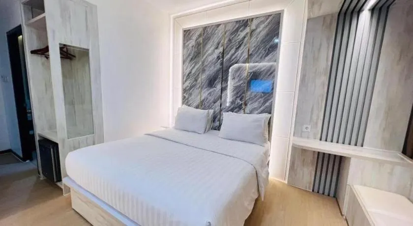 Bed in The Belagri Hotel and Convention