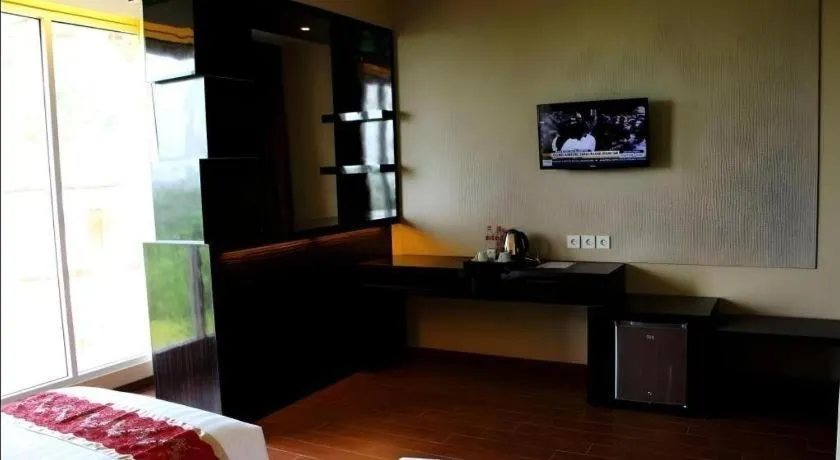 Bed in The Belagri Hotel and Convention