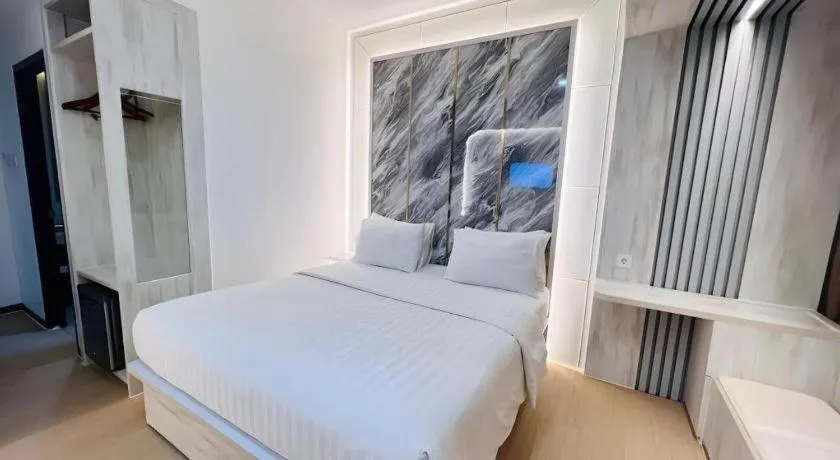 Bed in The Belagri Hotel and Convention