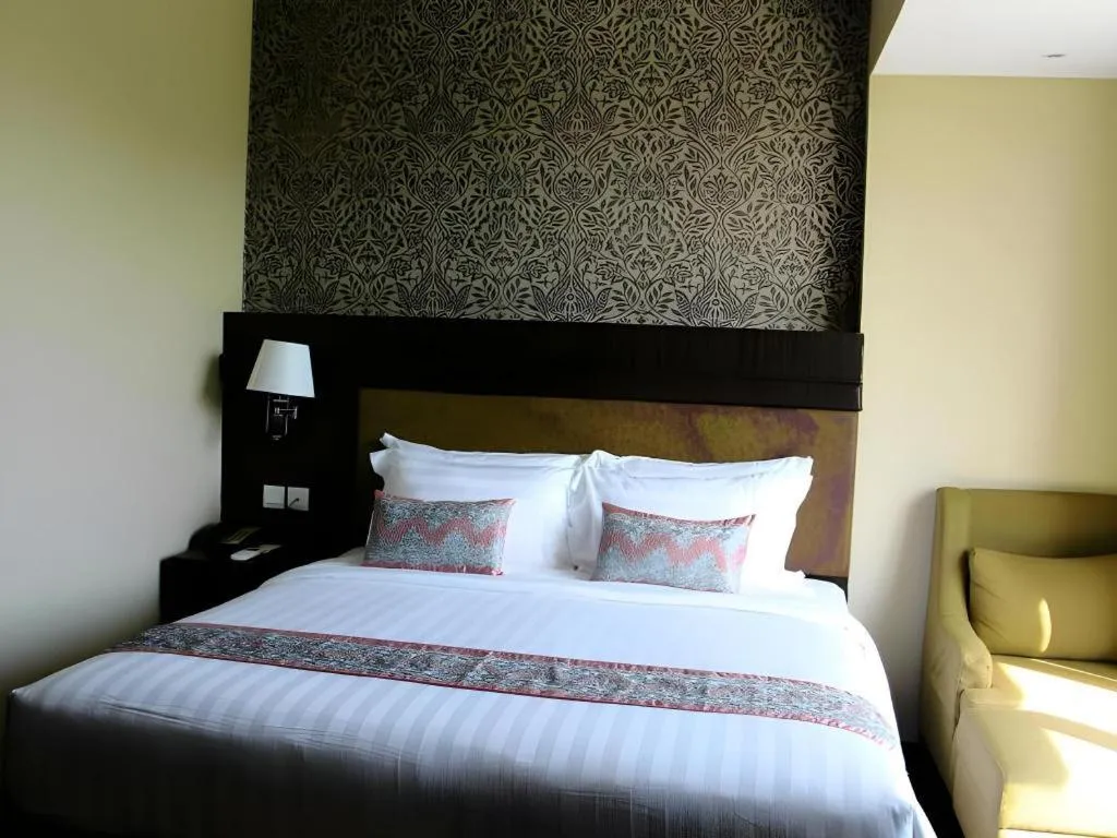 Bed in The Belagri Hotel and Convention