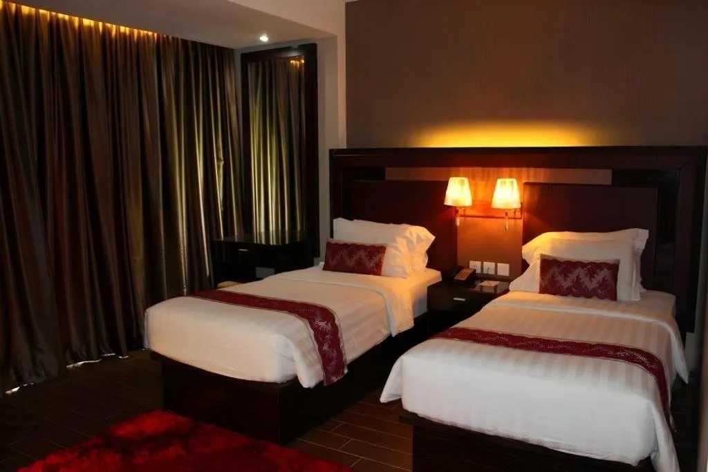 Bed in The Belagri Hotel and Convention