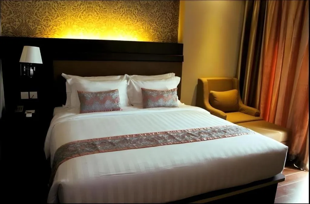 Bed in The Belagri Hotel and Convention