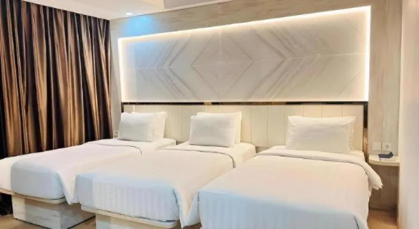 Bed in The Belagri Hotel and Convention