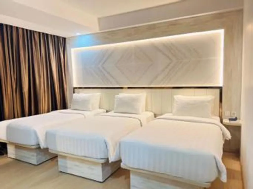 Bed in The Belagri Hotel and Convention