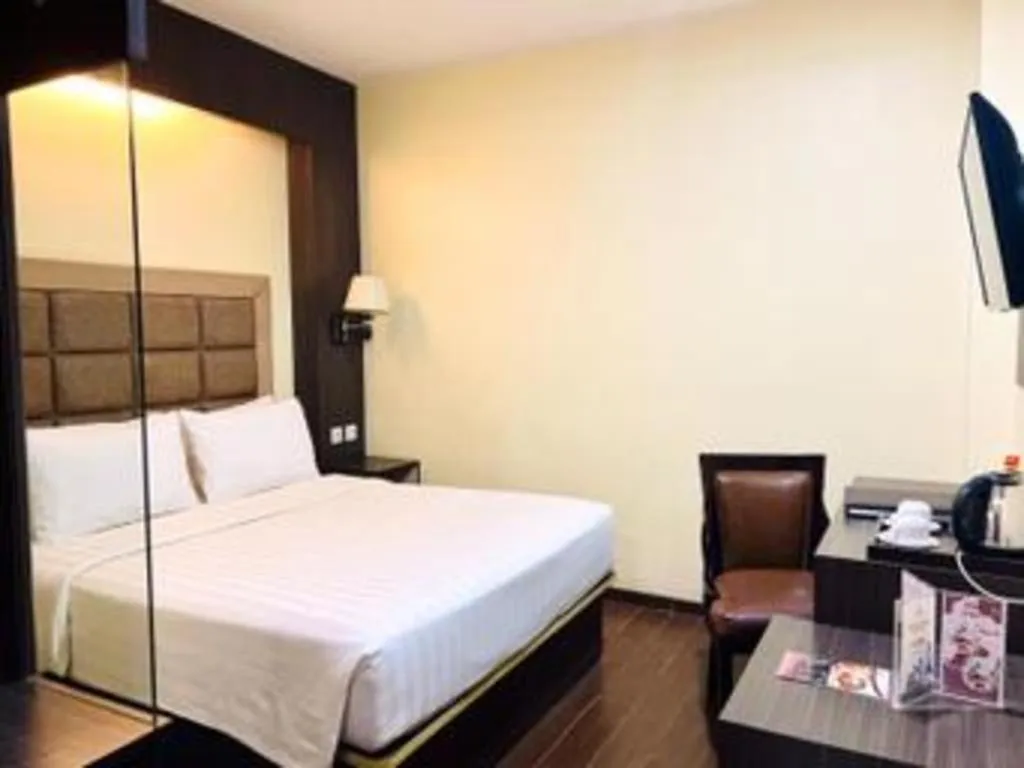 Bed in The Belagri Hotel and Convention