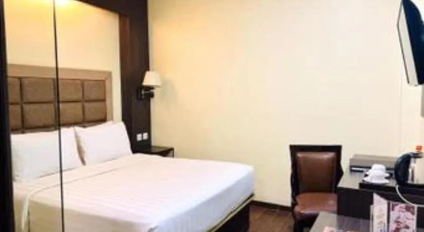 Bed in The Belagri Hotel and Convention