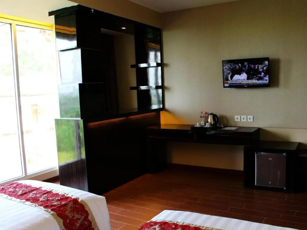 Bed in The Belagri Hotel and Convention