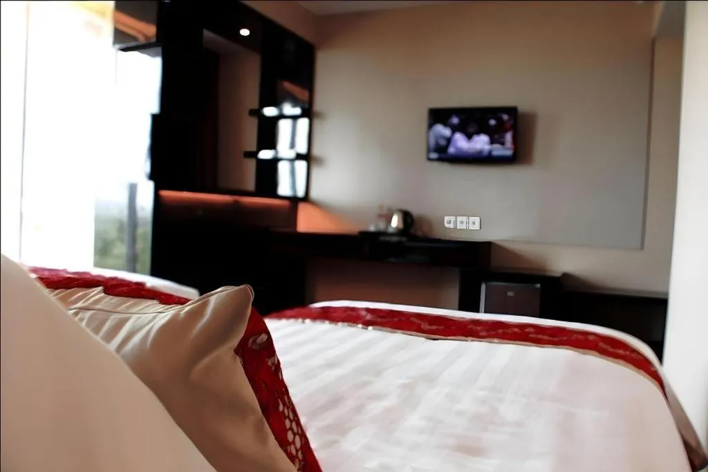 Bed in The Belagri Hotel and Convention