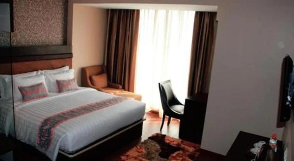 Bed in The Belagri Hotel and Convention