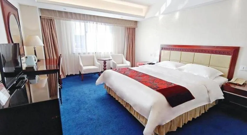 Bed in Dalian Southern Airline Pearl Hotel