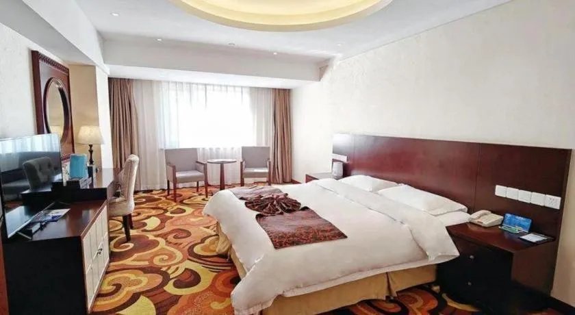 Bed in Dalian Southern Airline Pearl Hotel