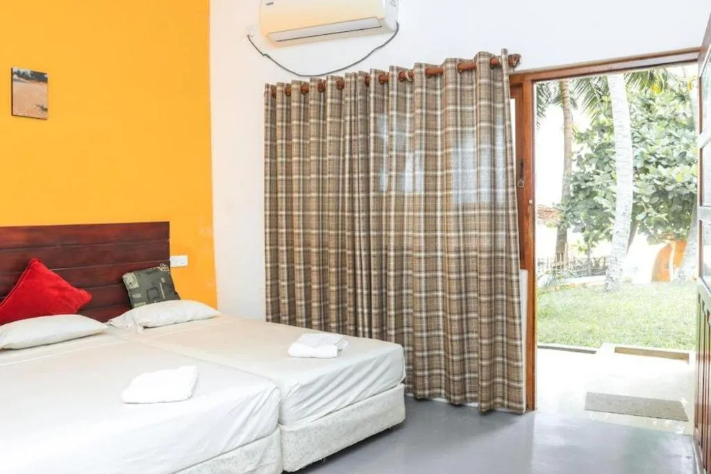 Bed in New Tristar Beach Hotel