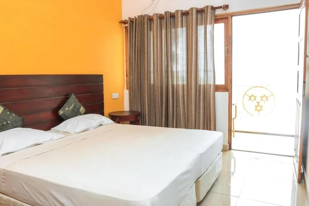 Bed in New Tristar Beach Hotel