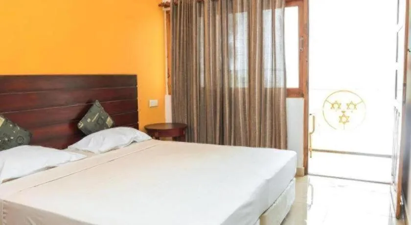 Bed in New Tristar Beach Hotel