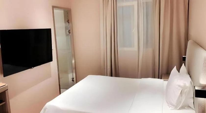 Bed in Hanting Hotel Shanghai People Square