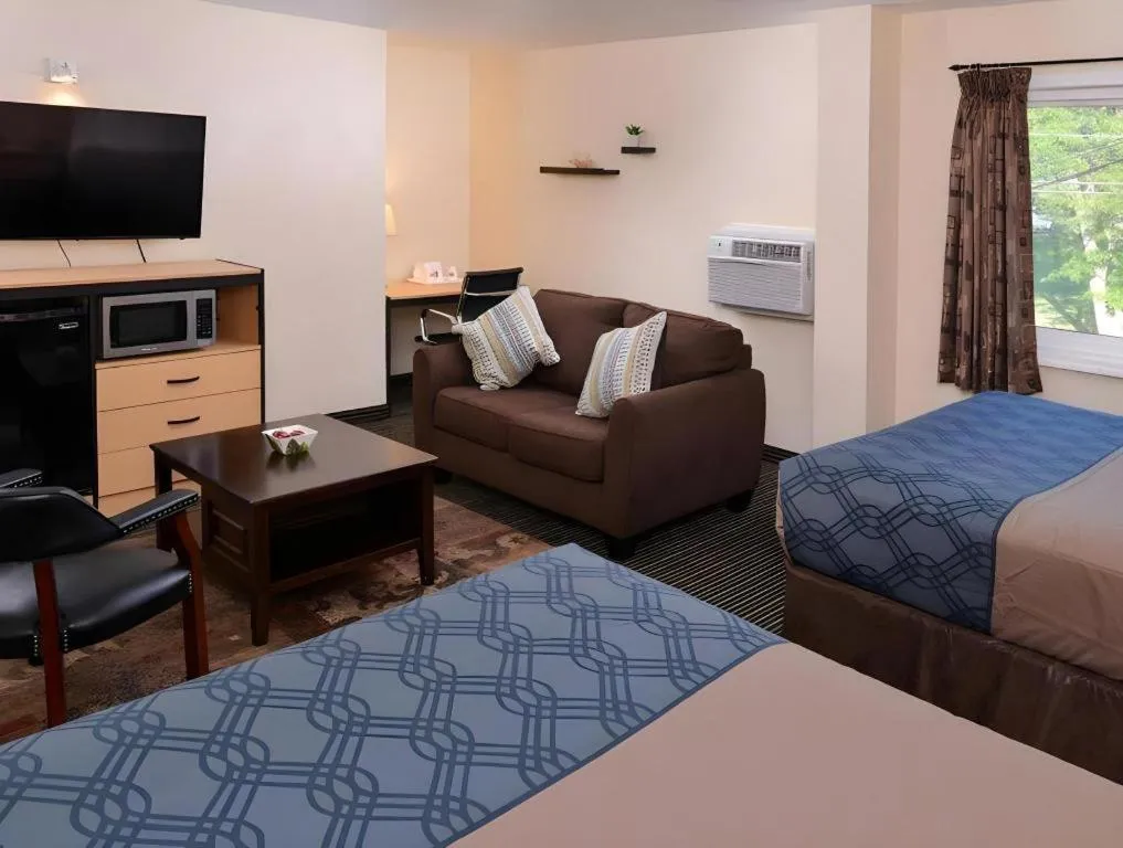 Bed in Econo Lodge Rochester I-90 & I-390