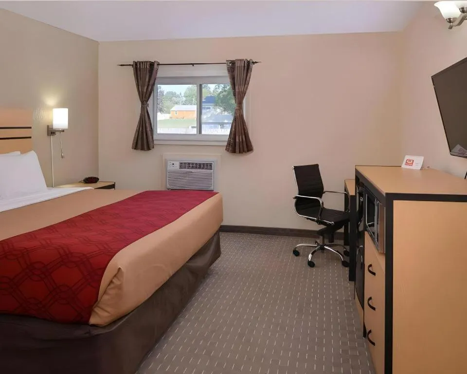 Bed in Econo Lodge Rochester I-90 & I-390