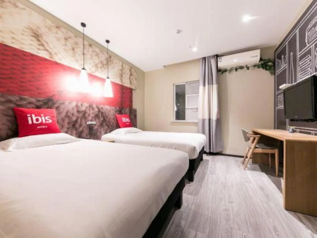 Bed in Ibis Nantong Qingnian