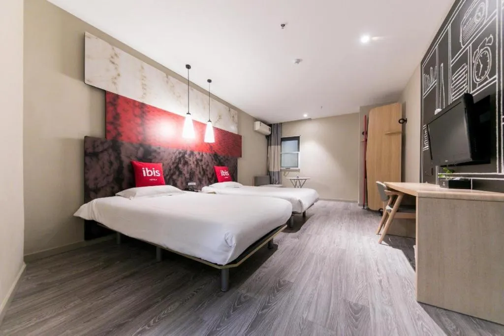 Bed in Ibis Nantong Qingnian