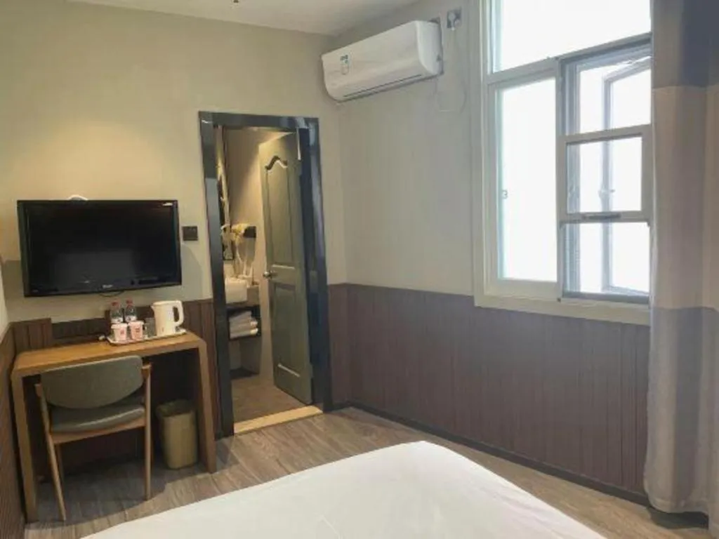 Bed in Ibis Nantong Qingnian