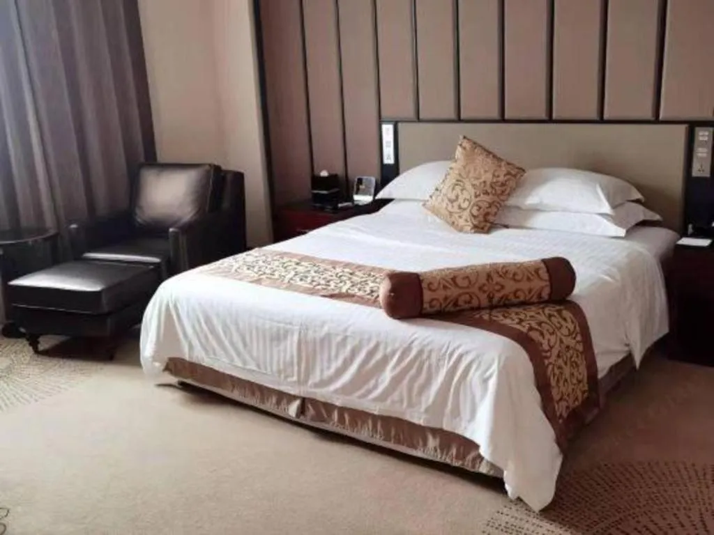 Bed in Jiuhua Jin Jiang International Hotel