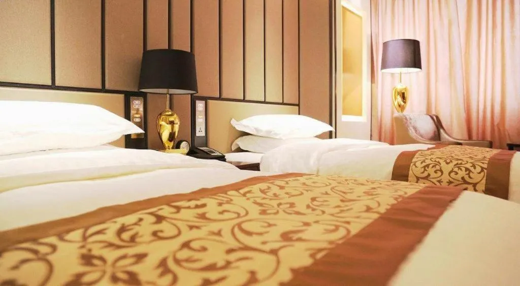 Bed in Jiuhua Jin Jiang International Hotel