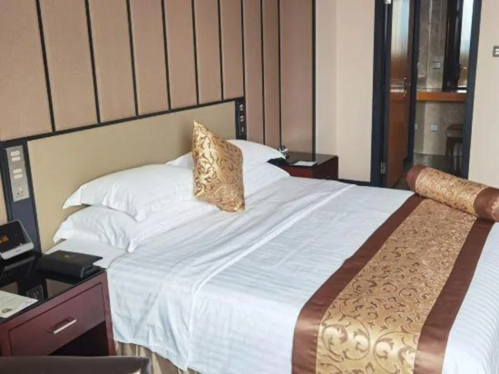 Bed in Jiuhua Jin Jiang International Hotel