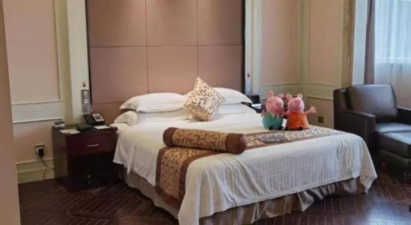 Bed in Jiuhua Jin Jiang International Hotel