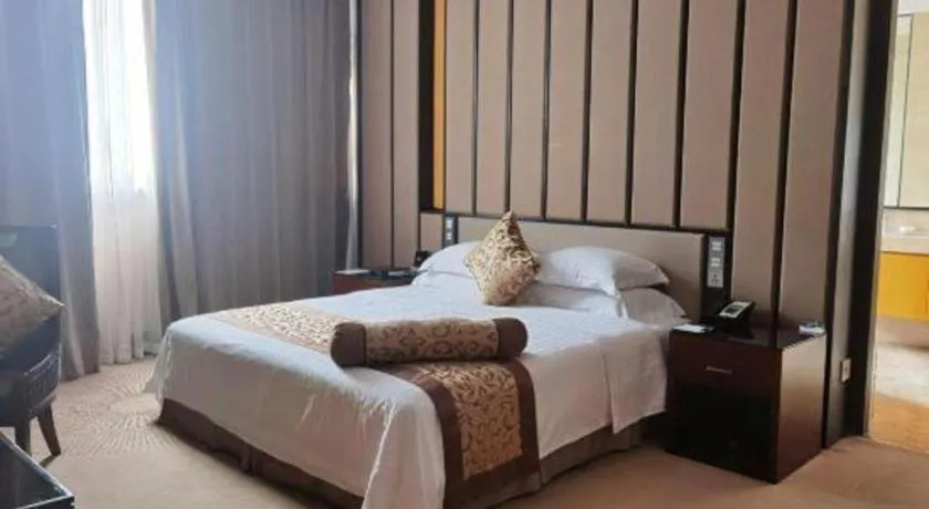 Bed in Jiuhua Jin Jiang International Hotel