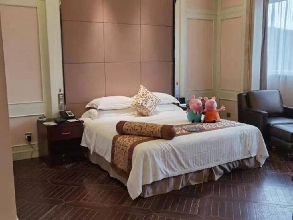 Bed in Jiuhua Jin Jiang International Hotel