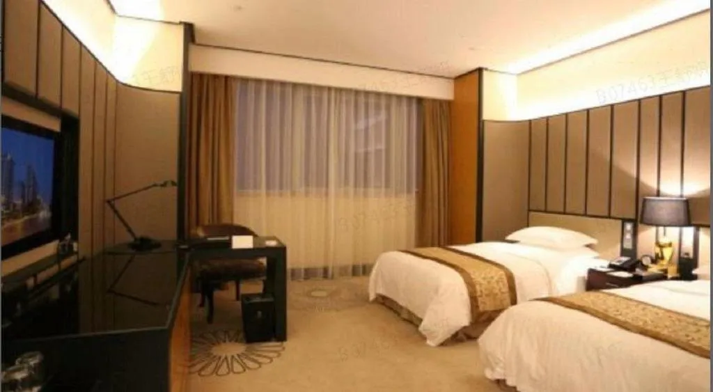 Bed in Jiuhua Jin Jiang International Hotel