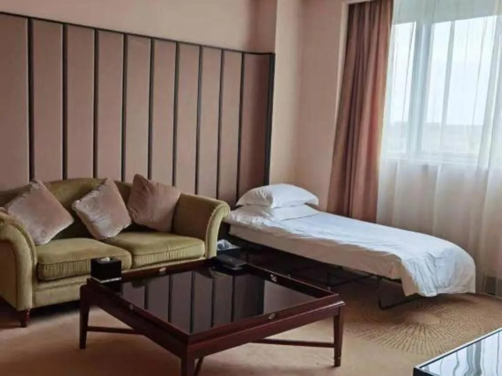 Bed in Jiuhua Jin Jiang International Hotel