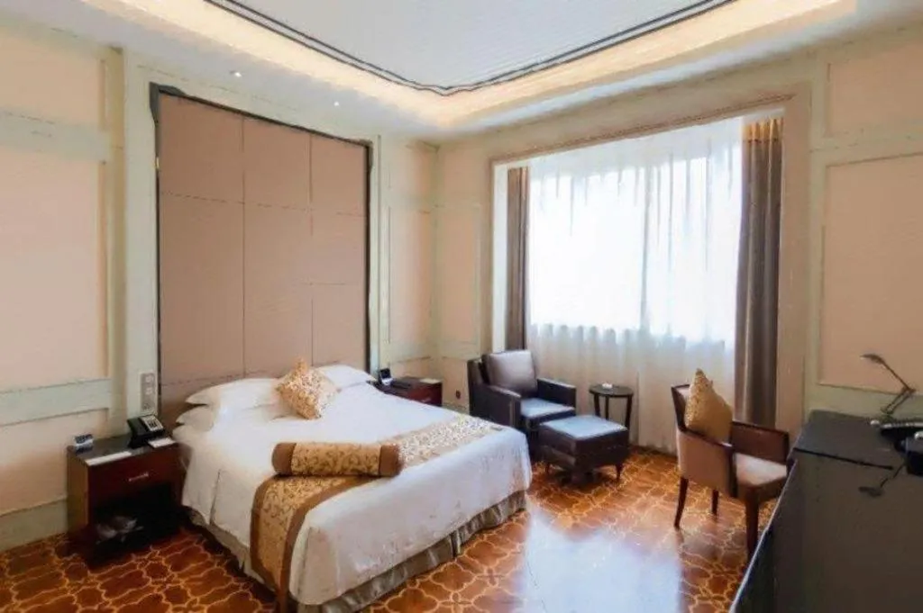 Bed in Jiuhua Jin Jiang International Hotel