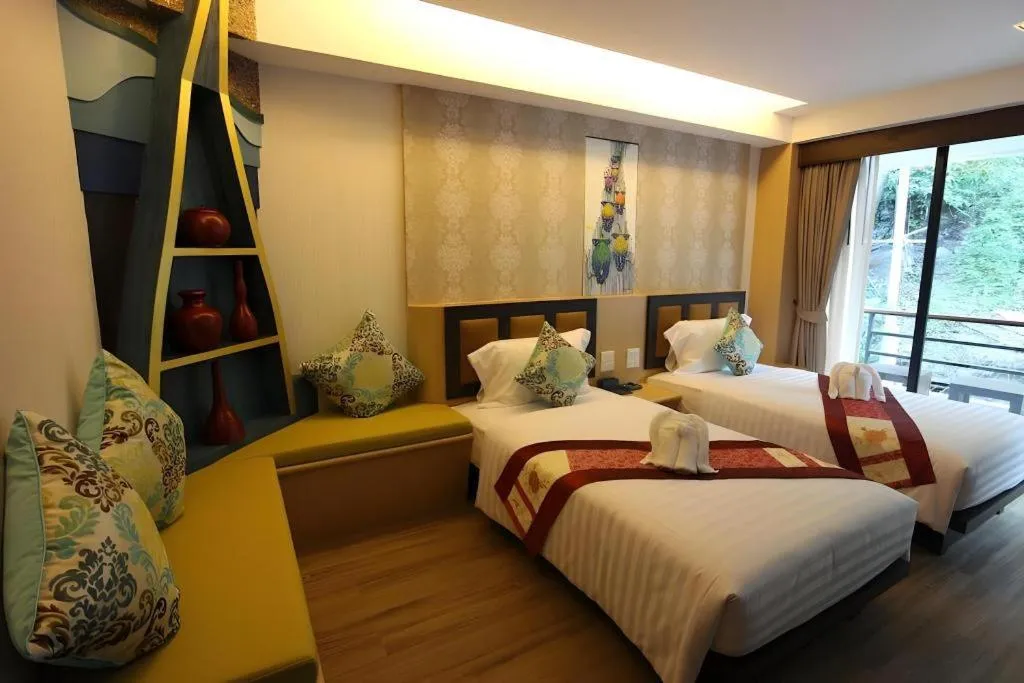 Bed in Phi Phi Nice Beach Hotel Hip