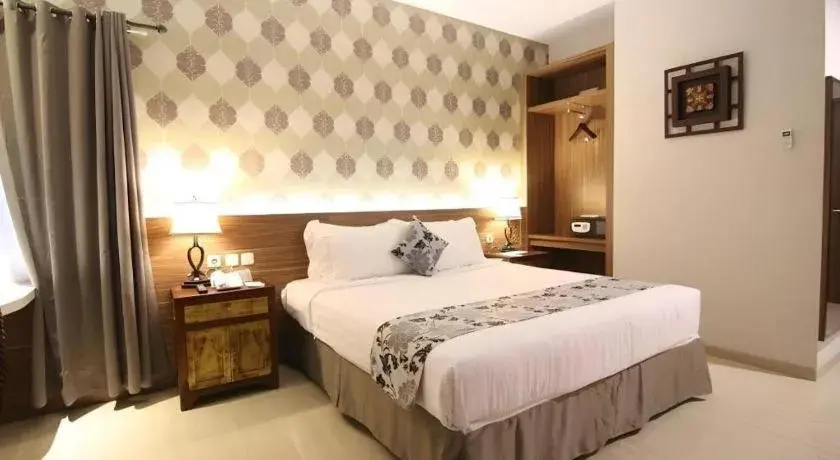 Bed in Grand Amira Hotel Solo, Azana Hotels Collection Bed in Grand Amira Hotel Solo, Azana Hotels Collection