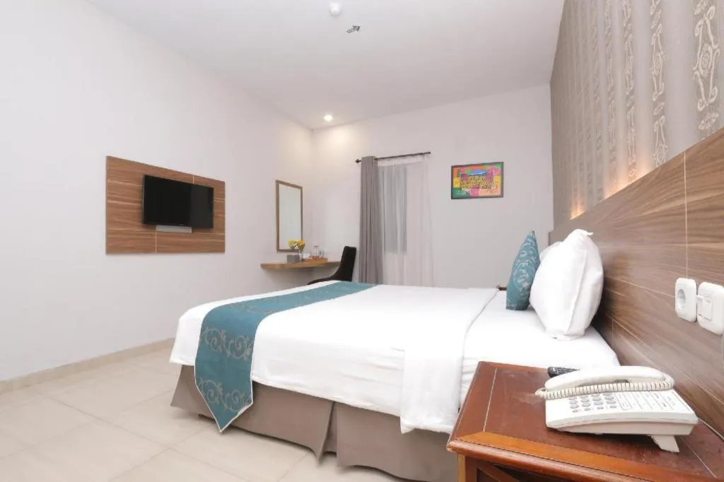 Bed in Grand Amira Hotel Solo, Azana Hotels Collection