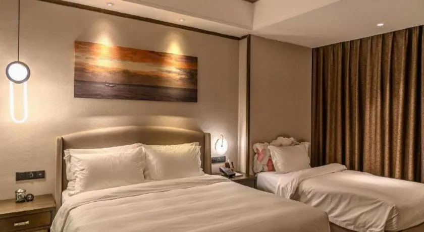 Bed in Zhuhai Starlight Hotel
