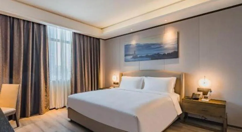 Bed in Zhuhai Starlight Hotel