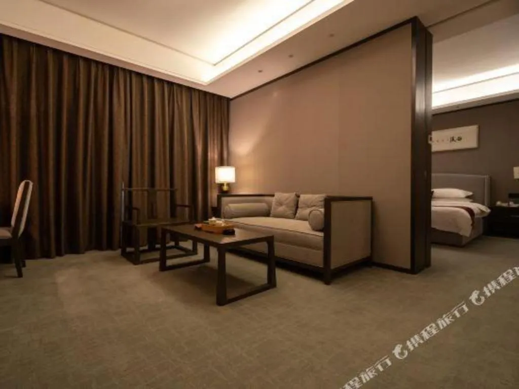 Bed in Zhuhai Starlight Hotel