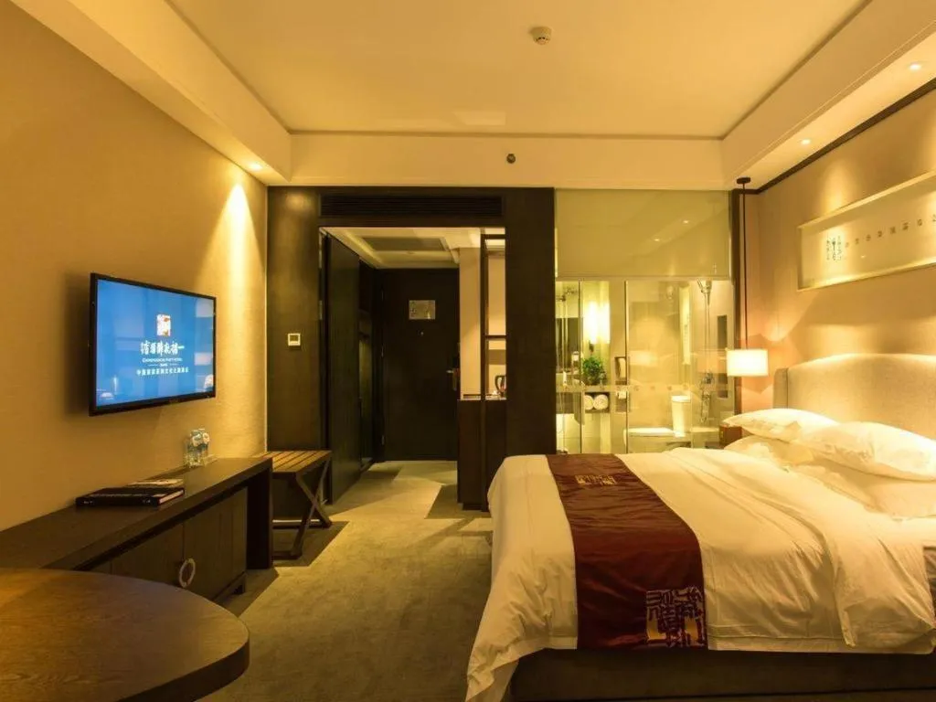 Bed in Zhuhai Starlight Hotel