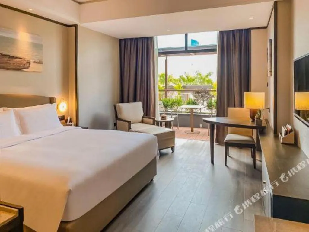 Bed in Zhuhai Starlight Hotel