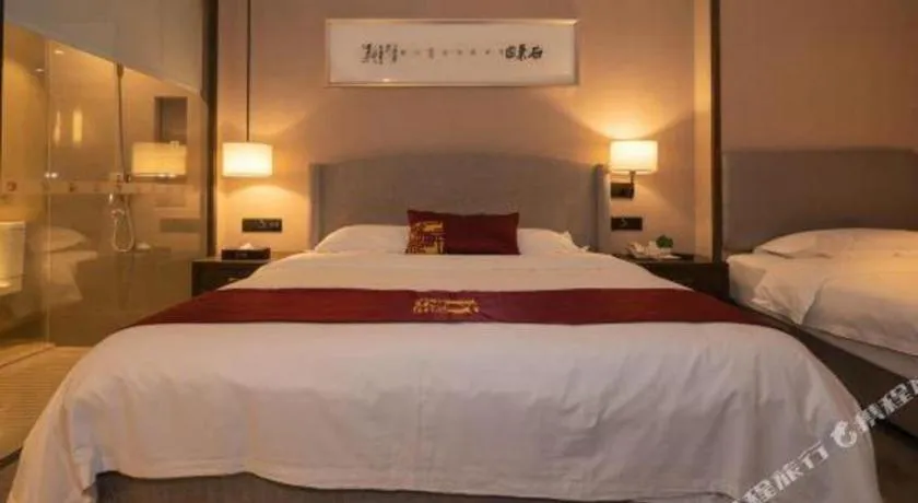 Bed in Zhuhai Starlight Hotel