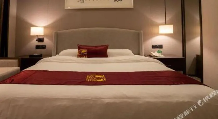 Bed in Zhuhai Starlight Hotel