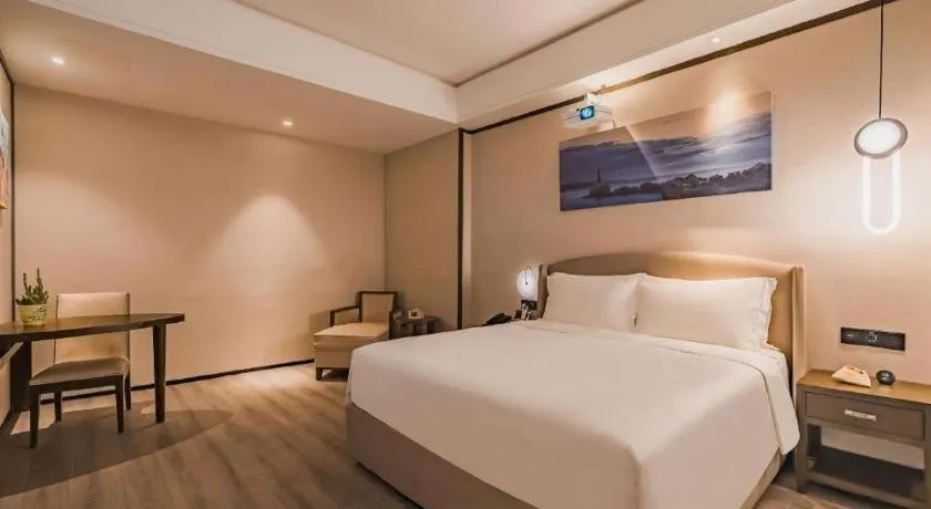 Bed in Zhuhai Starlight Hotel