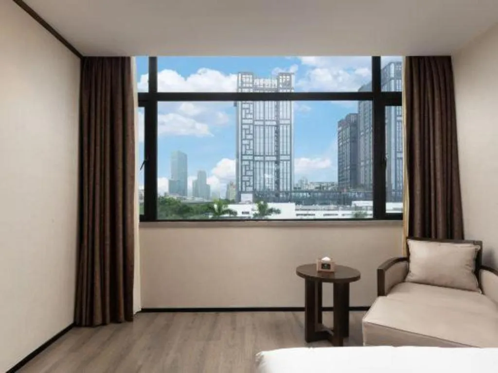 Bed in Zhuhai Starlight Hotel